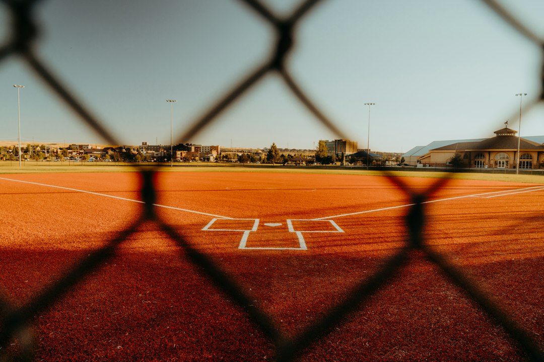 Baseball field through a fence; illustrative image for Wild Card schedule