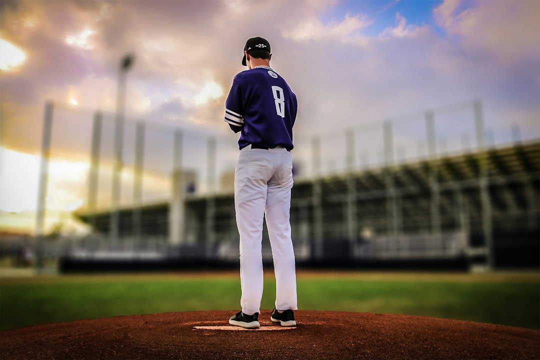 Baseball pitcher standing on the mound, illustrative image
