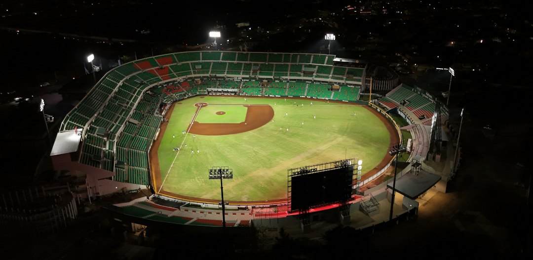 Illuminated baseball stadium during a game; illustrative image for MLB September 2026 awards