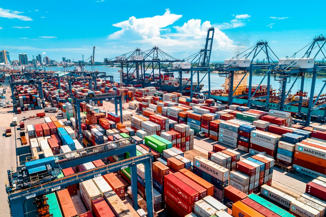 Cargo containers stacked at a seaport; illustrative image for the August 2026 U.S. goods trade report