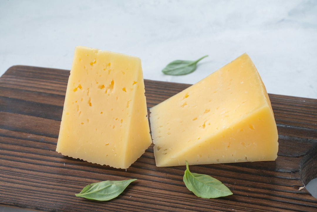Pieces of cheese on a wooden board; illustrative stock photo, not recalled Graziers cheese