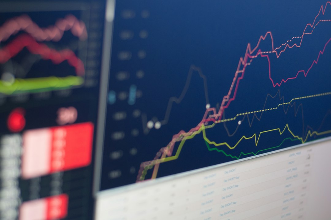Financial market charts displayed on trading screens, illustrating the September 30 stock-market close