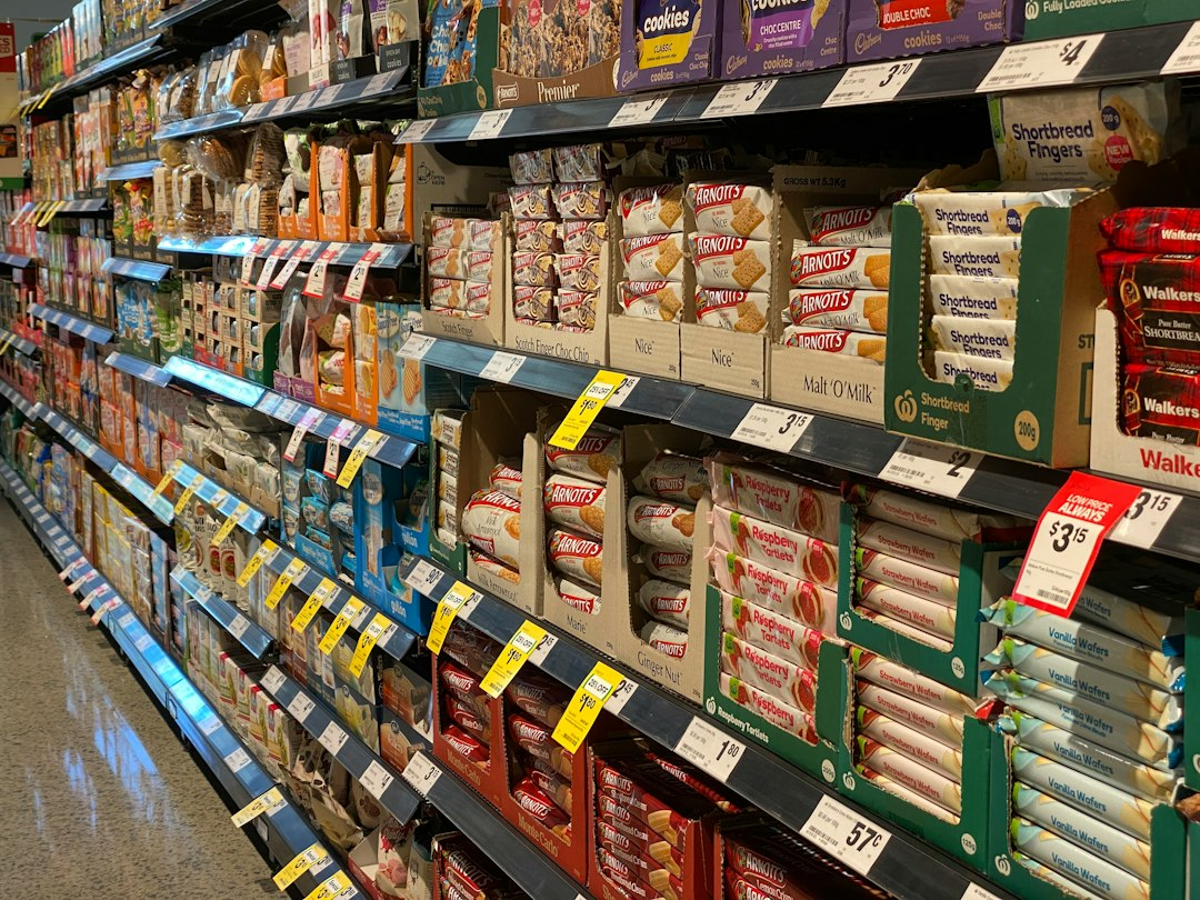 Shelves of groceries in a supermarket aisle; illustrative image for a consumer confidence survey