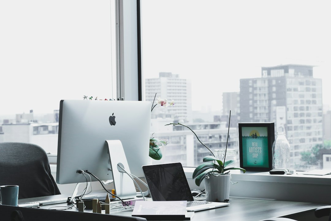 Sunlit office workspace with desks and chairs; illustrative image for U.S. job openings data