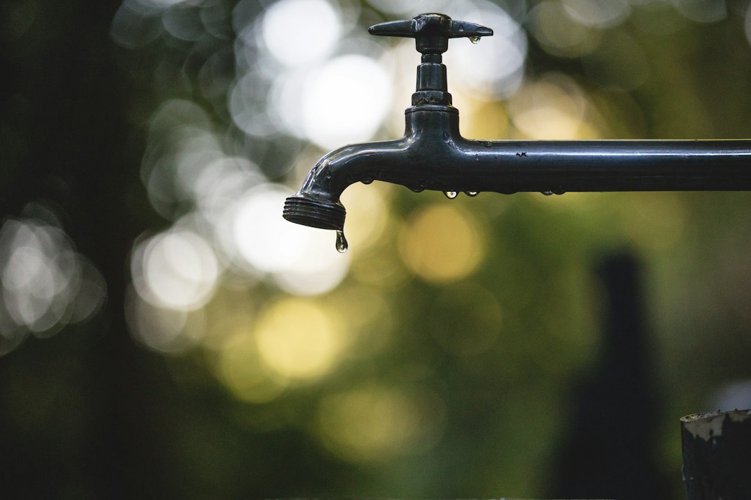 Water running from a tap; illustrative image for safe water and sanitation, not a cholera outbreak location