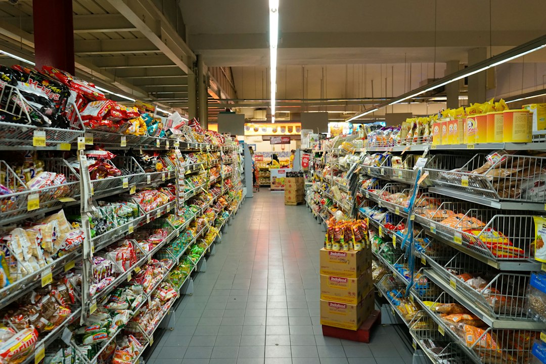 Shelves in a supermarket food aisle; illustrative image for consumer spending and inflation