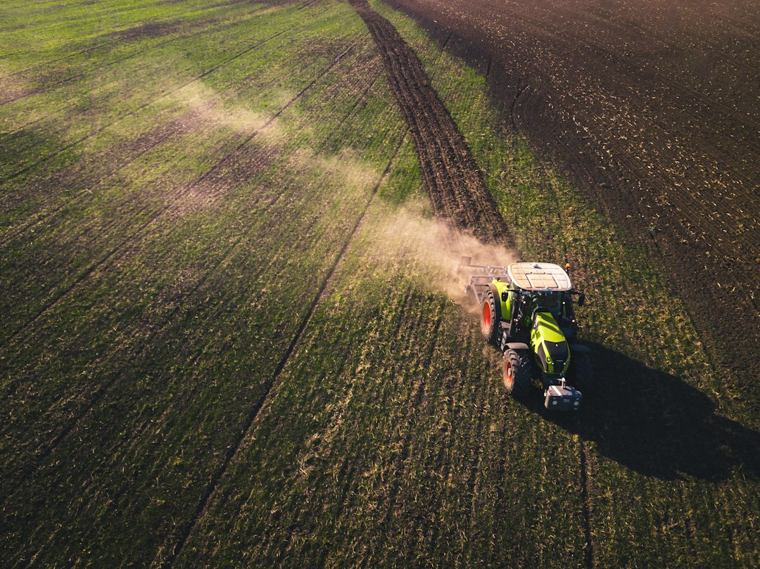 Tractor in a green field; illustrative image for pesticide competition coverage