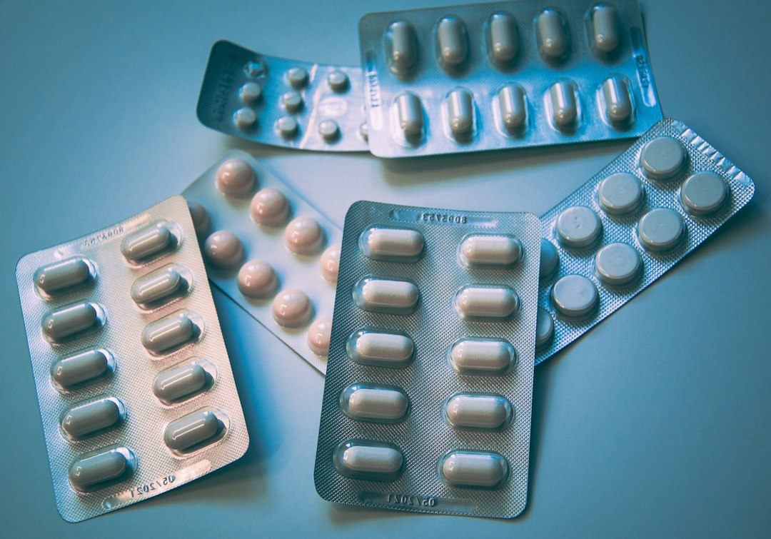 Tablets and medicine containers on a clean surface