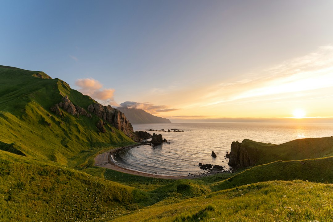 Adak Island in Alaska's Aleutian chain beneath a dramatic sky