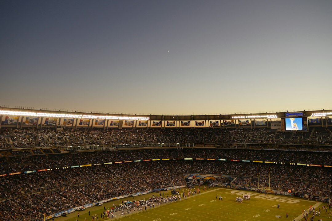 American football stadium and field viewed from the stands