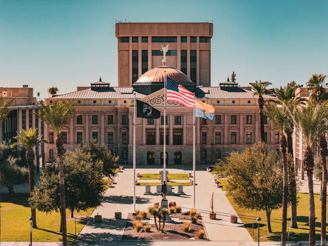 Arizona State Capitol building in Phoenix beneath a bright sky