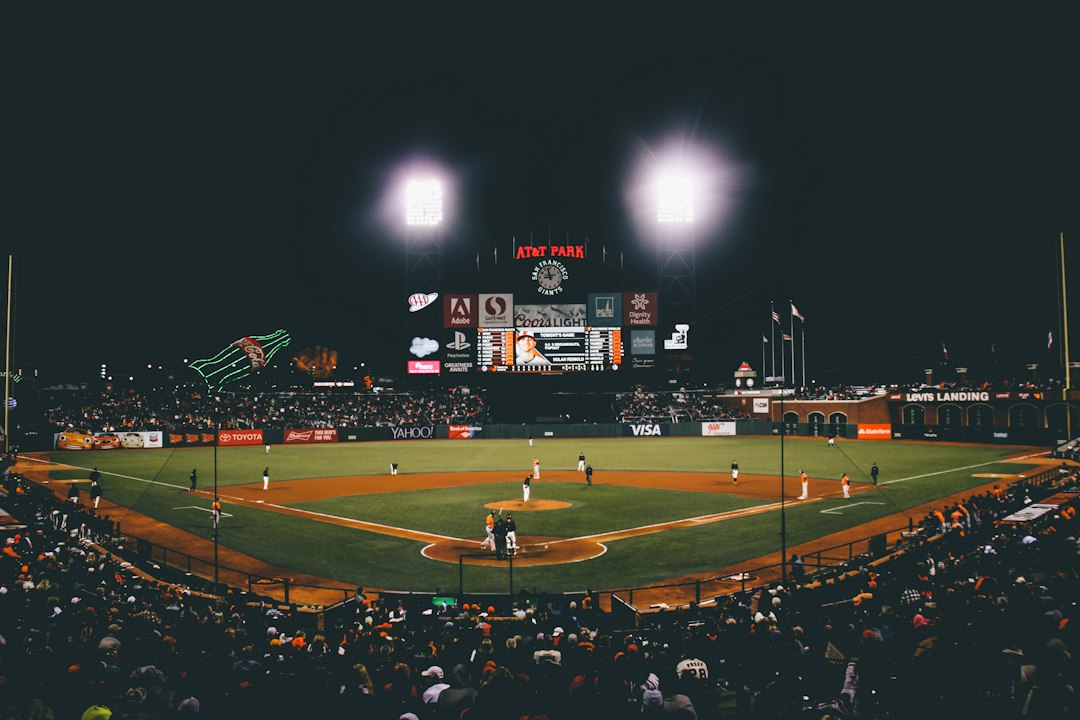 Crowd watching a baseball game in a stadium; illustrative photograph