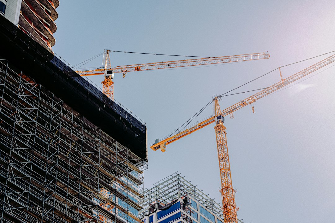 Tower cranes at an active urban construction site