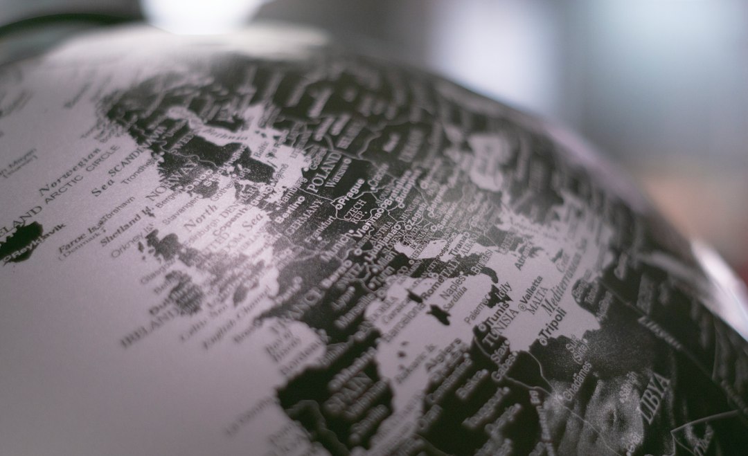 Desk globe representing global economic risks and international policy