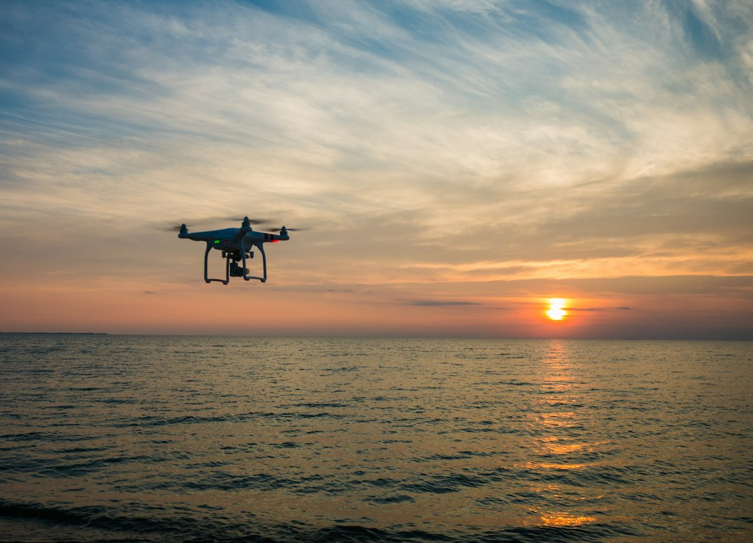 A drone flying over water, illustrating Ukraine's drone aid delivery to occupied Oleshky
