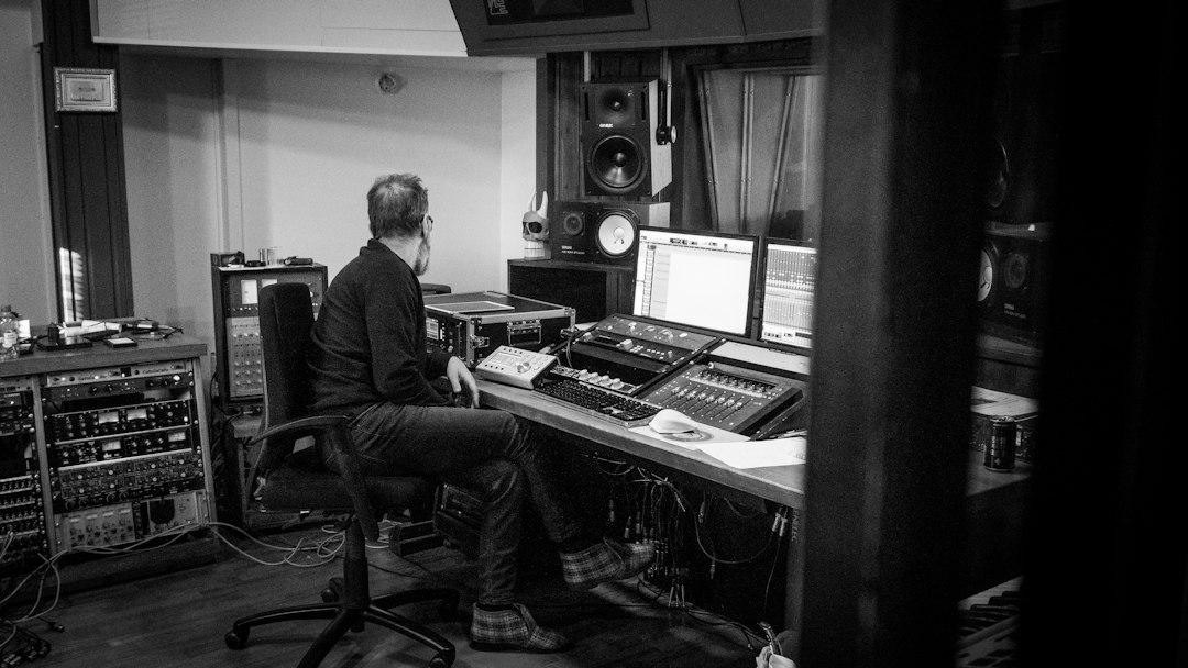 Audio producer working in a recording studio