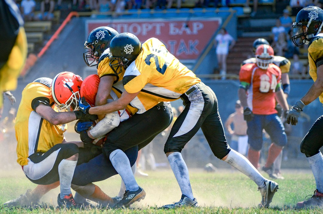 Football players competing during a game