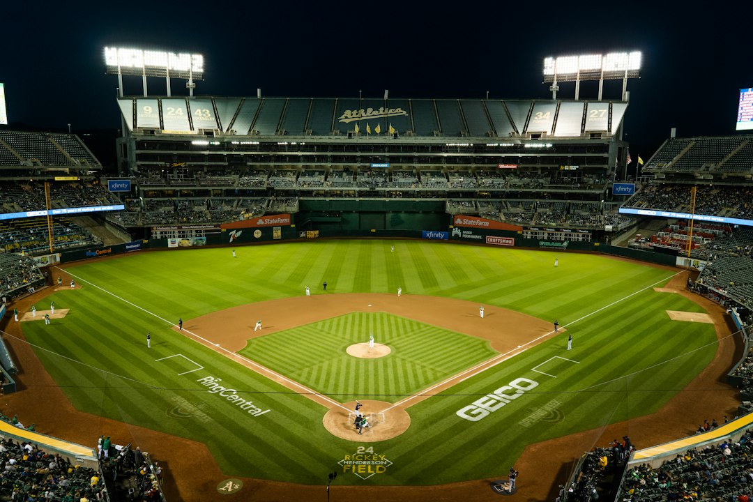 Illustrative baseball stadium filled with spectators