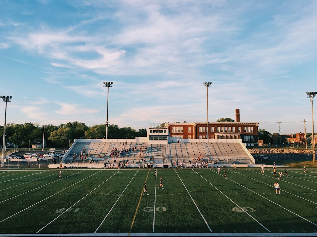 Illustrative American football stadium with spectators