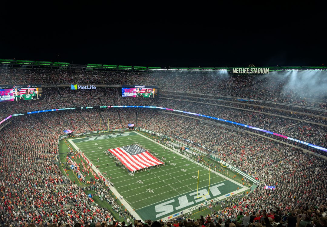 Illustrative football stadium filled with fans