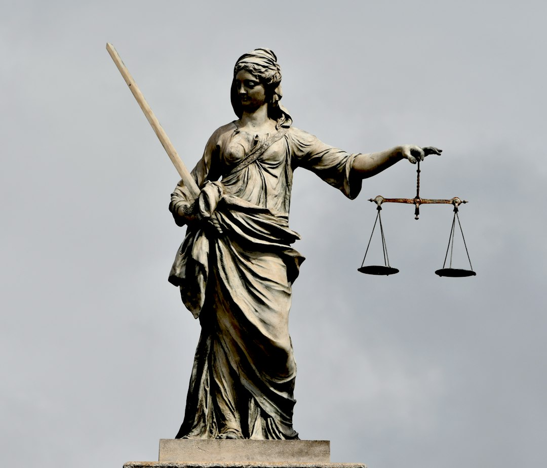 Lady Justice statue holding scales and a sword