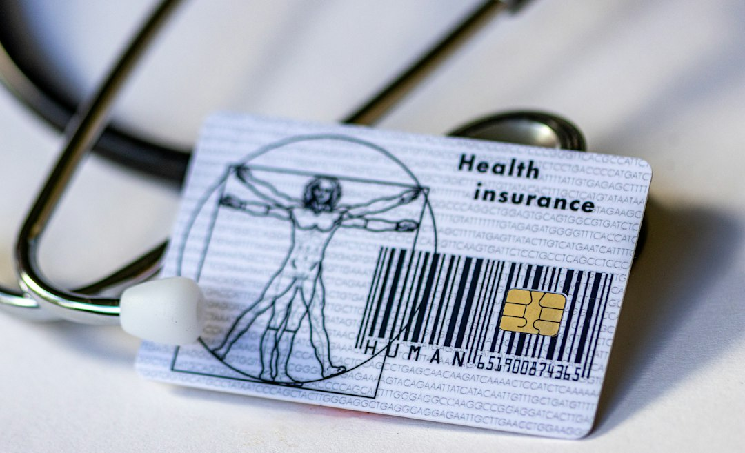 Health insurance card and stethoscope illustrating Marketplace enrollment verification