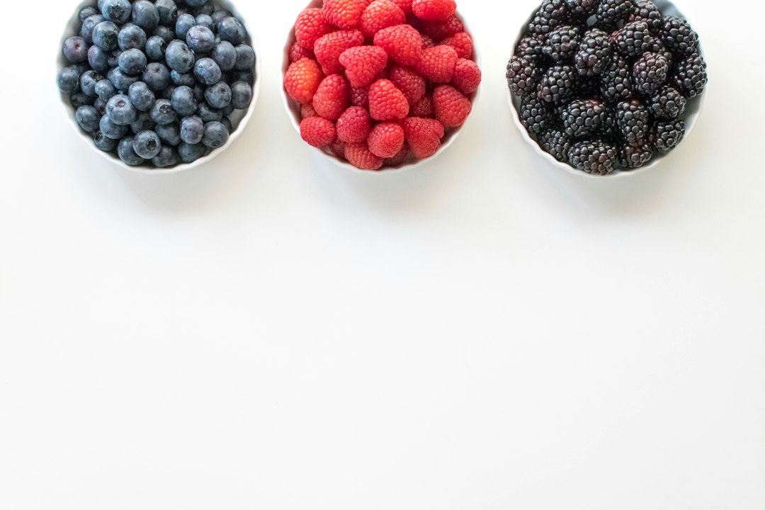 A bowl filled with blueberries, raspberries and blackberries