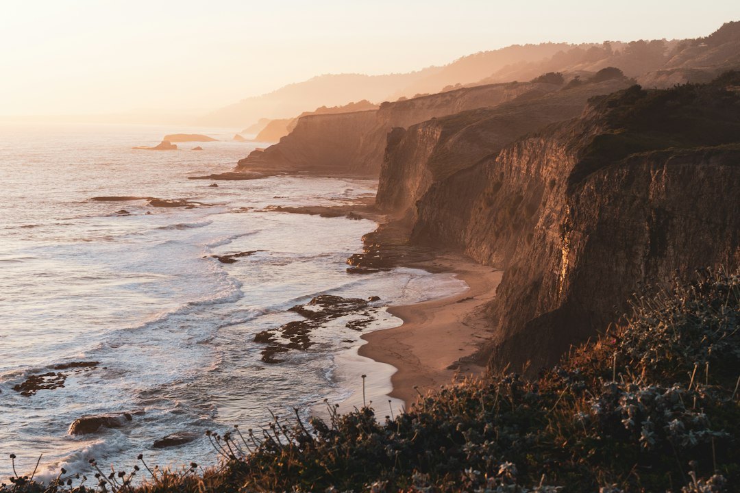 Waves breaking along the California coastline